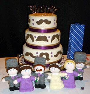 The wedding cake made by a friend featured icing moustaches