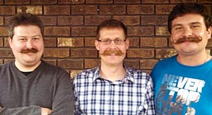 Triumphantly Moustached - The Brothers Theriault L to R: Aaron, Bryan and Mark - Click to enlarge